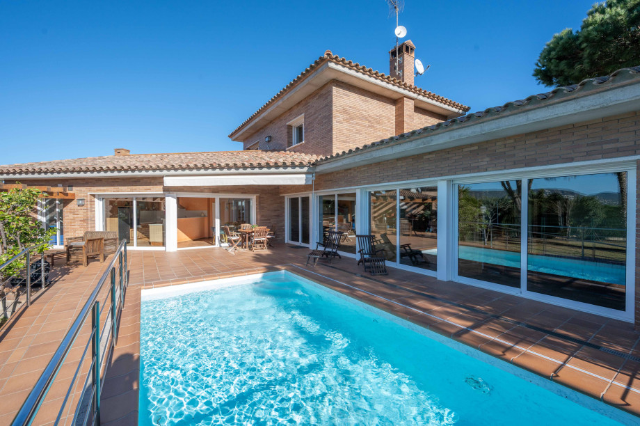 Villa in Sant Daniel with swimming pool on foreground.