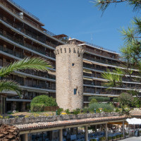 Old surveillance tower in front of apartments in Sant Antoni de Calonge.
